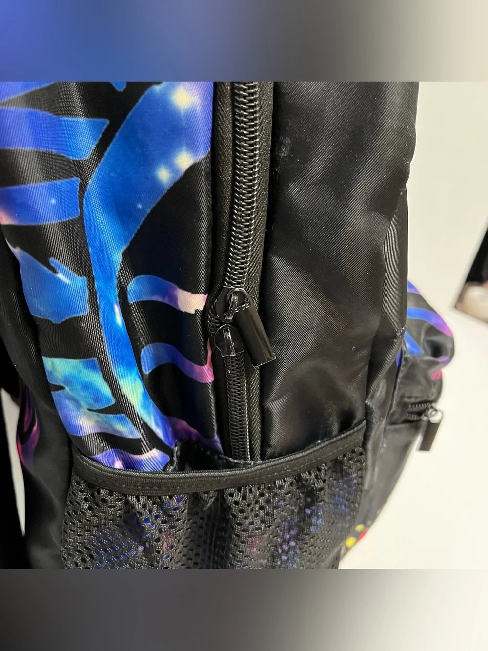 Infinite STS Graphic Black Backpack with Neon Paint-Splash